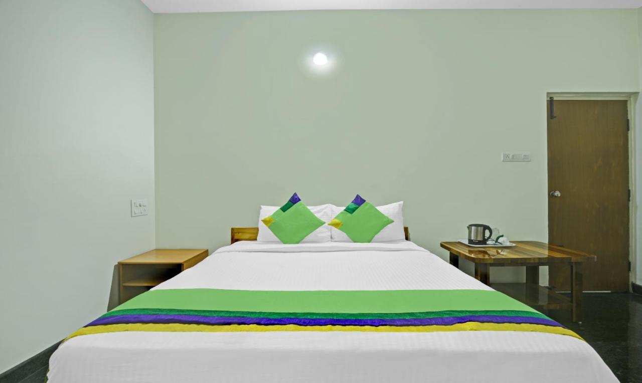 Treebo Trend Karan Residency Hotel Mysore